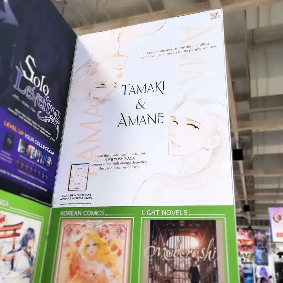Discover the Stunning Tamaki & Amane Banner at SakuraCon2025 and Get Fumi Yoshinaga's Latest Work!